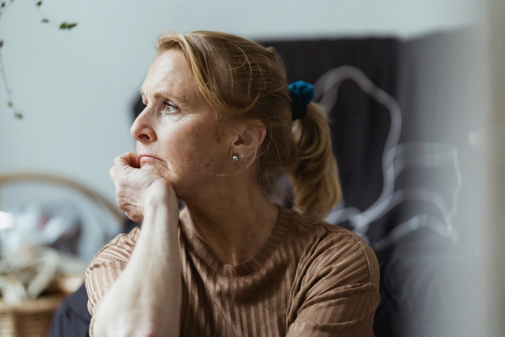 Woman in her 50s reflecting on how much super should I have for retirement